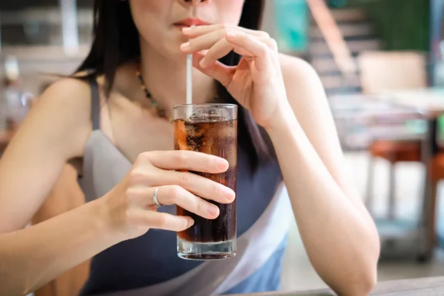 Drinking coca cola
